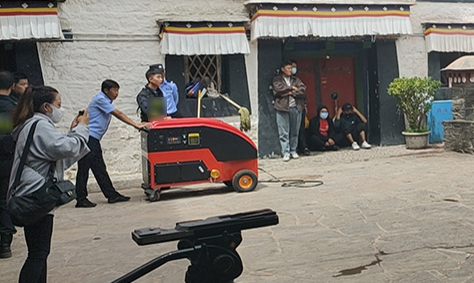 在线买世界杯平台电动高压细水雾参与大昭寺消防趣味运动会